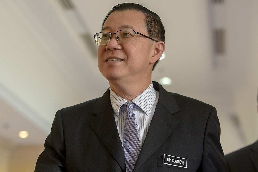 Finance Minister Lim Guan Eng arrives for a press conference at the Ministry of Finance in Putrajaya May 24, 2018. u00e2u20acu201d Picture by Mukhriz Hazimn
