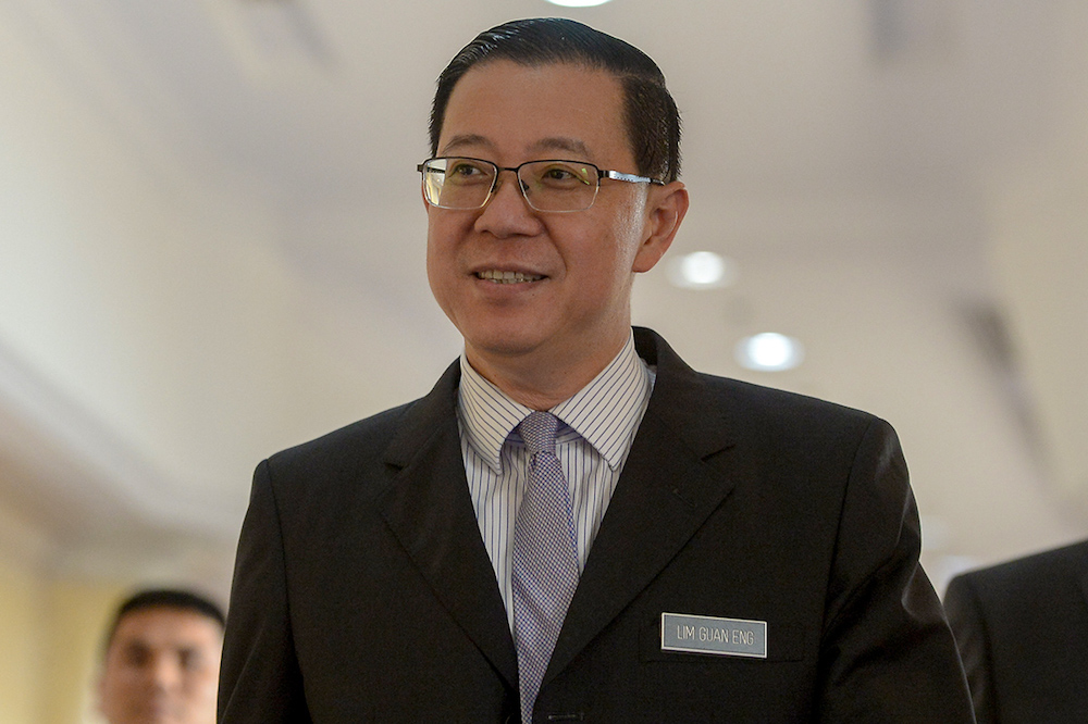 Finance Minister Lim Guan Eng arrives for a press conference at the Ministry of Finance in Putrajaya May 24, 2018. u00e2u20acu201d Picture by Mukhriz Hazimn