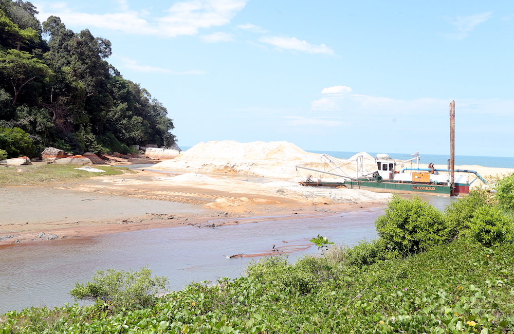 A dredge is marooned at the mouth of Sungai Puyu that leads to Pasir Panjang beach in Teluk Senangin February 1, 2018. u00e2u20acu201d Picture by Farhan Najib