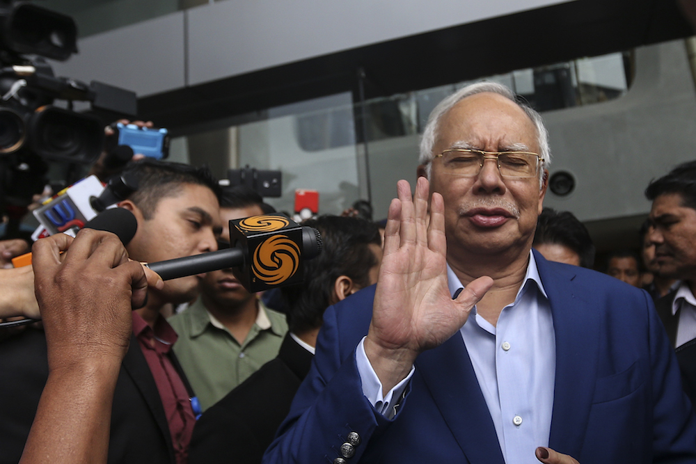 Former Prime Minister Datuk Seri Najib Razak reacts to questions by the media while leaving the MACC headquarters in Putrajaya May 22, 2018. u00e2u20acu201d Picture by Azneal Ishak