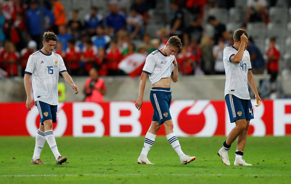 Russia's Roman Zobnin, Aleksei Miranchuk and Anton Miranchuk look dejected after the match against Austria at Tivoli Stadion Tirol, Innsbruck May 30, 2018. u00e2u20acu201d Reuters pic