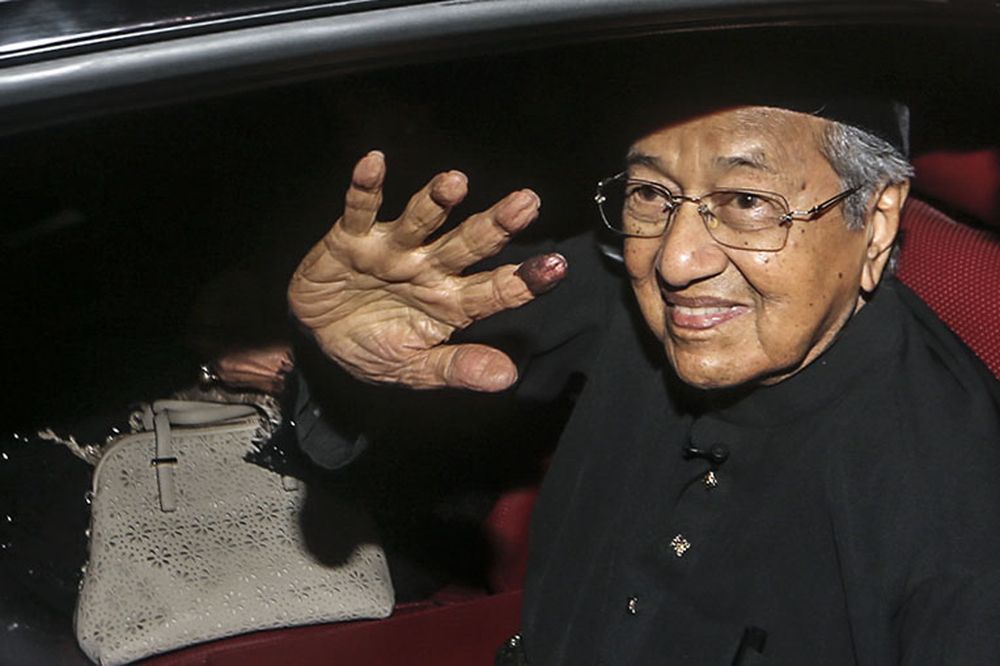 Tun Dr Mahathir waves as he leaves Istana Negara as the new Prime Minister of Malaysia, May 10, 2018. u00e2u20acu201d Picture by Azneal Ishak