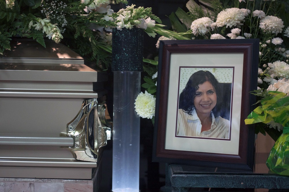 A picture of journalist Alicia Diaz Gonzalez sits next to her coffin during the funeral in Monterrey, northern Mexico, on May 25, 2018. u00e2u20acu201d AFP pic