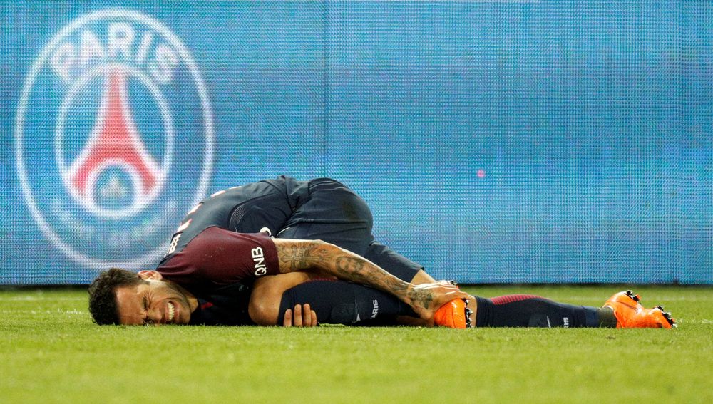 Paris Saint-Germainu00e2u20acu2122s Dani Alves after sustaining an injury during their Ligue 1 match against AS Monaco at Parc des Princes, Paris, April 15, 2018. u00e2u20acu201d Reuters pic