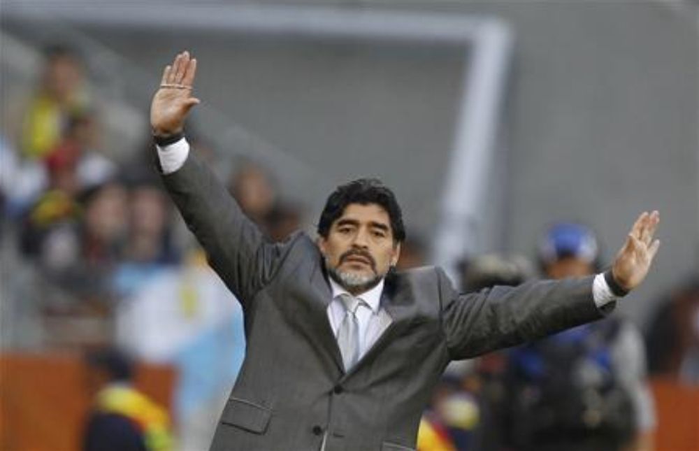 File picture shows Argentinau00e2u20acu2122s coach Diego Maradona gesturing during the 2010 World Cup quarter-final match against Germany at Green Point stadium in Cape Town July 3, 2010. u00e2u20acu201d Reuters pic