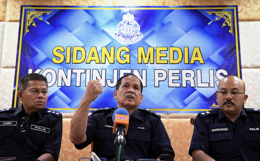 Perlis police chief Datuk Azisman Alias answers questions during a press conference in Kangar May 3, 2018. u00e2u20acu201d Bernama pic