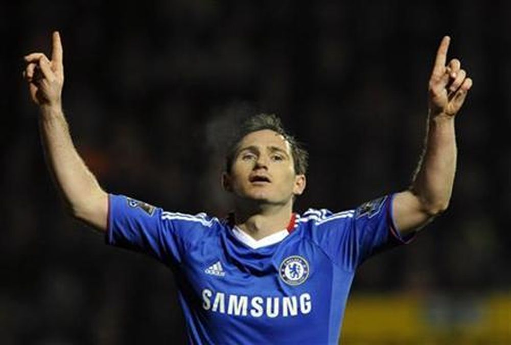 File picture shows Chelseau00e2u20acu2122s Frank Lampard celebrating after scoring from the penalty spot during their Premier League match against Blackpool, March 7, 2011. u00e2u20acu201d Reuters pic