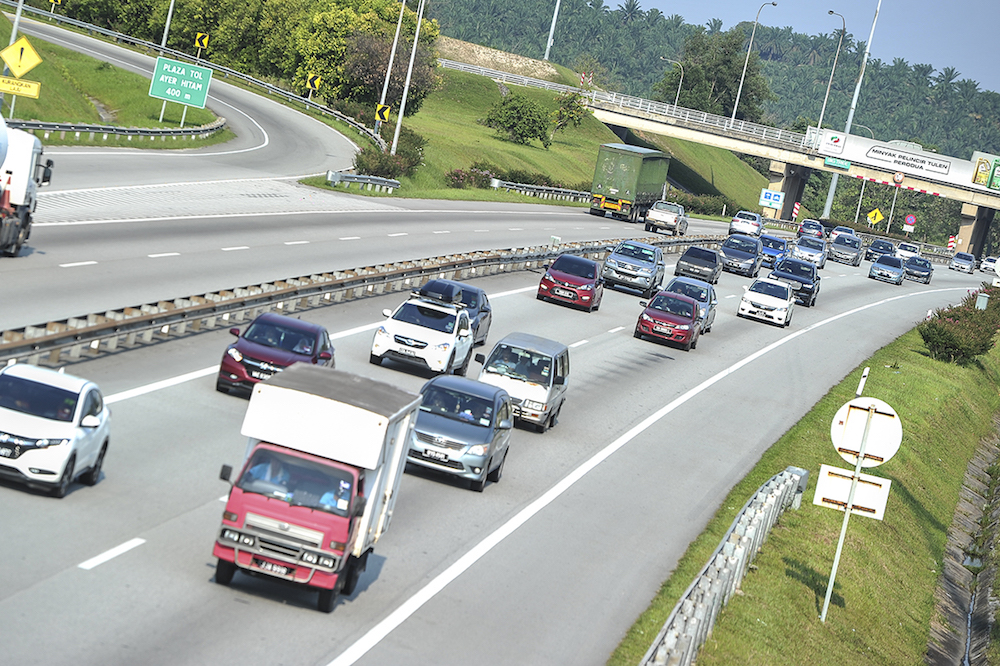 Heavy traffic is seen along the North-South Highway towards Johor Baru ahead of Polling Day, in Ayer Hitam May 8, 2018. u00e2u20acu201d Picture by Shafwan Zaidon