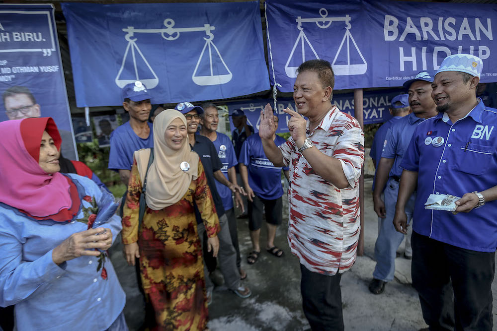 Barisan Nasional (BN) Kukup state seat candidate, Datuk Md Othman Yusof, meets residents on his campaign trail in Pontian May 7, 2018. u00e2u20acu201d Picture by Hari Anggara