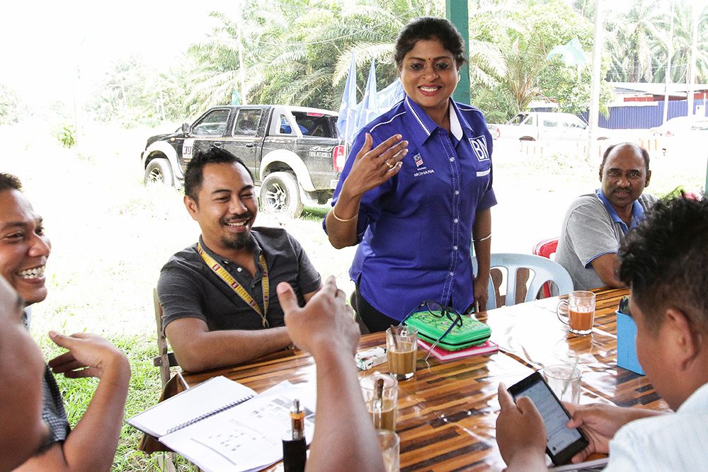 BN candidate for Kapar Datuk Mohana Muniandy greets members of the public during a walkabout in Kapar on May 3, 2018. u00e2u20acu201d Picture by Miera Zulyana