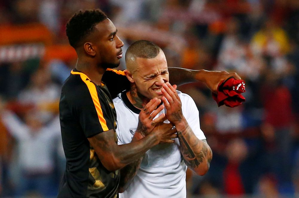 Roma's Radja Nainggolan and Gerson look dejected after the match against Liverpool, May 3, 2018. u00e2u20acu2022 Reuters pic