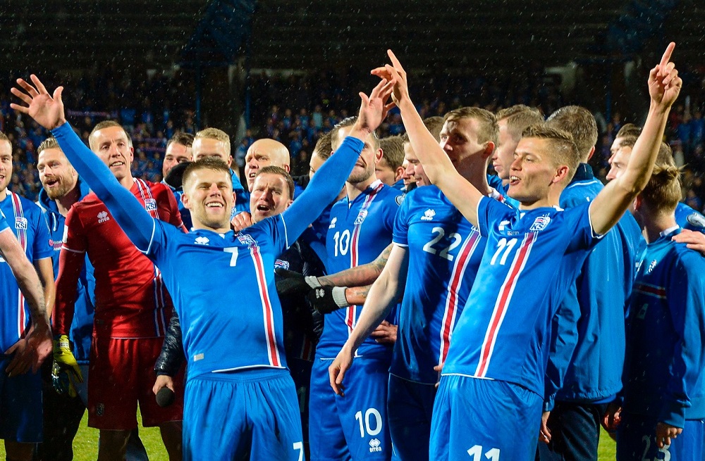 Icelandu00e2u20acu2122s players including Johann Berg Gudmundsson (left) and Alfred Finnbogason celebrate after the Fifa World Cup 2018 qualification football match against Kosovo in Reykjavik, Iceland October 9, 2017. u00e2u20acu201d AFP pic