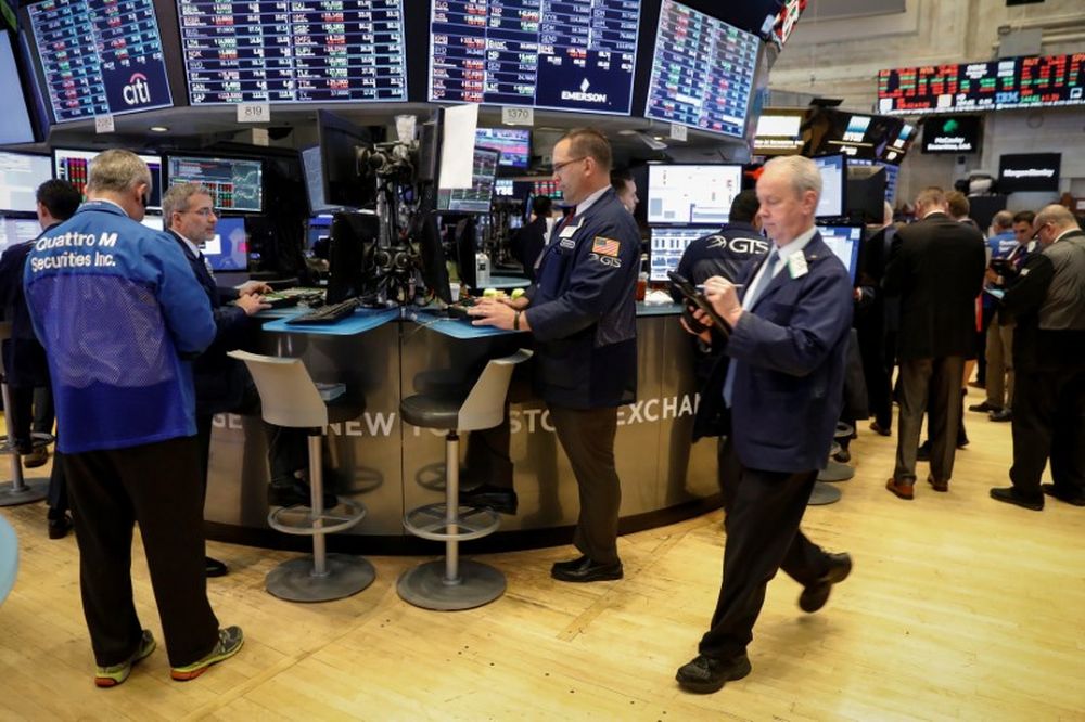 Traders work on the floor of the New York Stock Exchange (NYSE) in New York. u00e2u20acu2022 Reuters pic