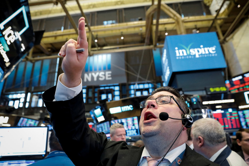 Trader Michael Capolino shouts out a bid on the floor of the New York Stock Exchange (NYSE) May 3, 2018. u00e2u20acu201d Reuters pic 