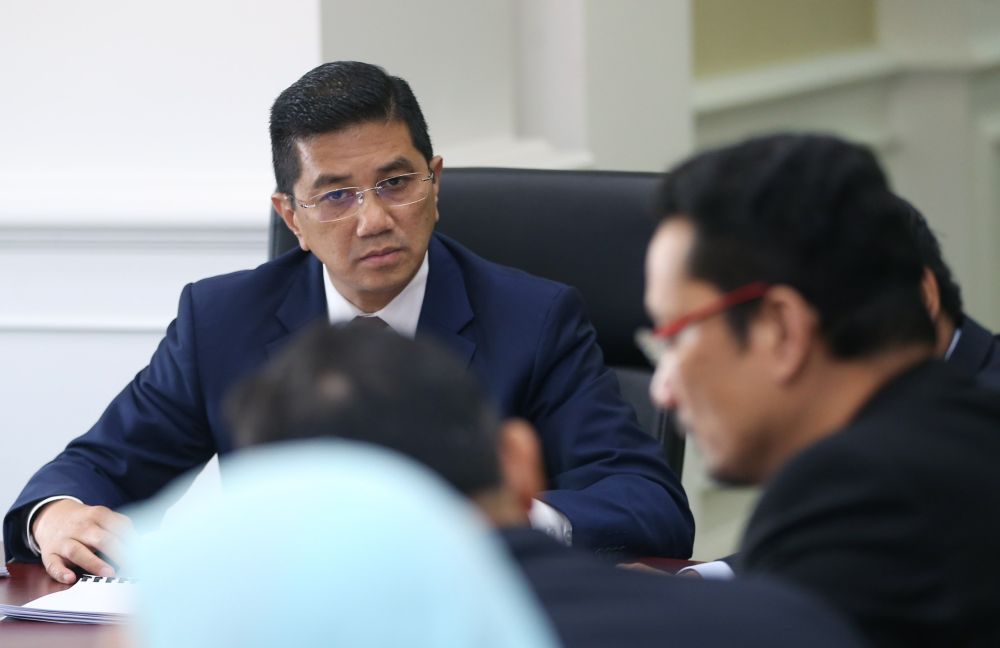 Minister of Economic Affairs Datuk Seri Mohamed Azmin Ali chairs the first meeting with the management of the Economic Planning Unit (EPU) at the Ministerial Office of the Prime Minister's Department in Putrajaya May 22, 2018. u00e2u20acu2022 Picture by Razak Ghazali