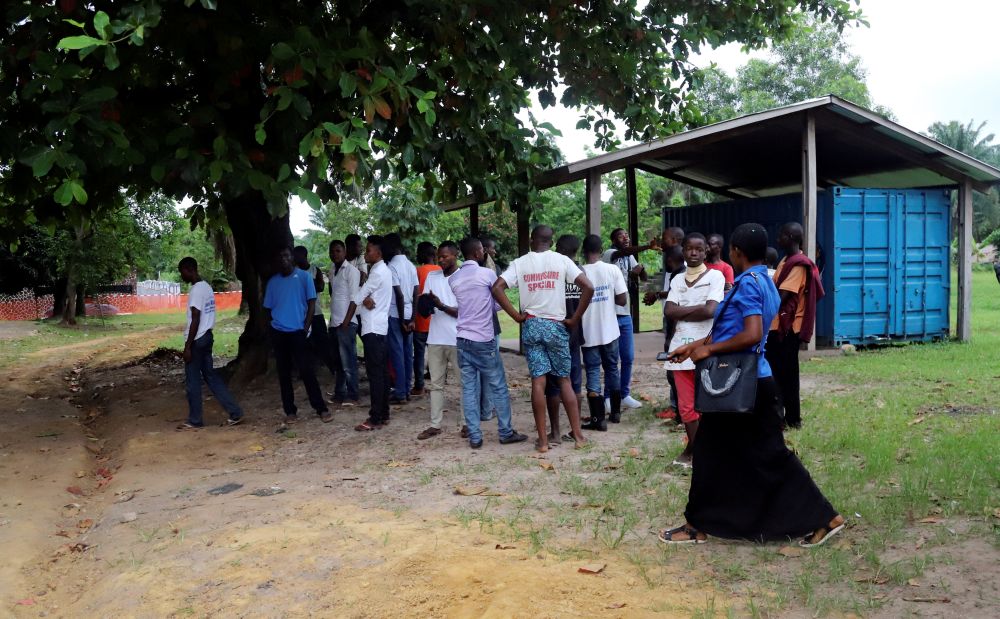 Residents gather near a safety ribbon in the area which is prepared to receive suspected Ebola cases, at the Mbandaka General Hospital, in Mbandaka, Democratic Republic of Congo May 20, 2018. u00e2u20acu201d Reuters pic