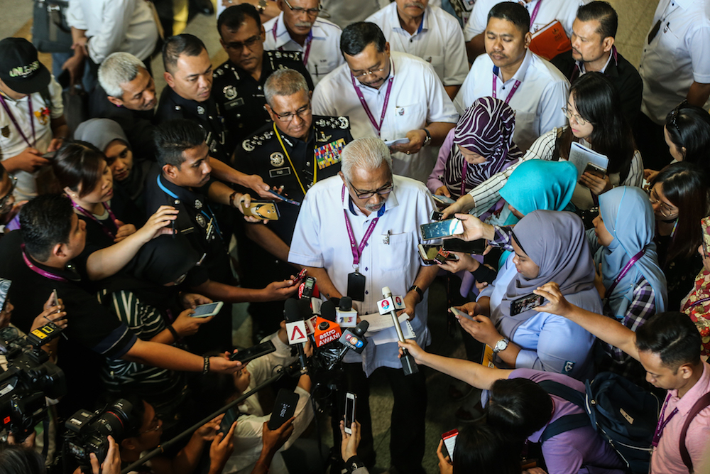 Election Commission chairman Tan Sri Mohd Hashim Abdullah speaks to the media in Bukit Aman, Kuala Lumpur May 5, 2018. u00e2u20acu201d Picture by Ahmad Zamzahuri