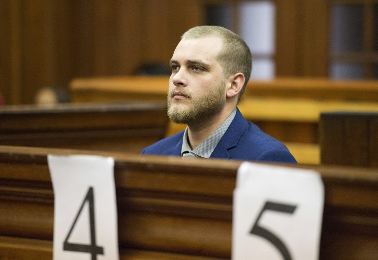 Henri van Breda sits in the dock at the Western Cape High Court, in Cape Town on May 21, 2018, to hear the verdict in his trial. u00e2u20acu201d AFP pic