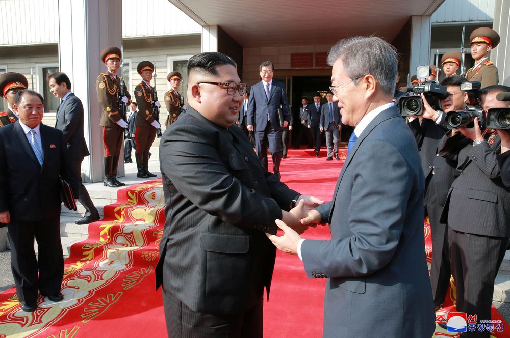 South Korean President Moon Jae-in shakes hands with North Korean leader Kim Jong Un during their summit at the truce village of Panmunjom, North Korea, on May 26, 2018. u00e2u20acu201d KCNA/Reuters pic