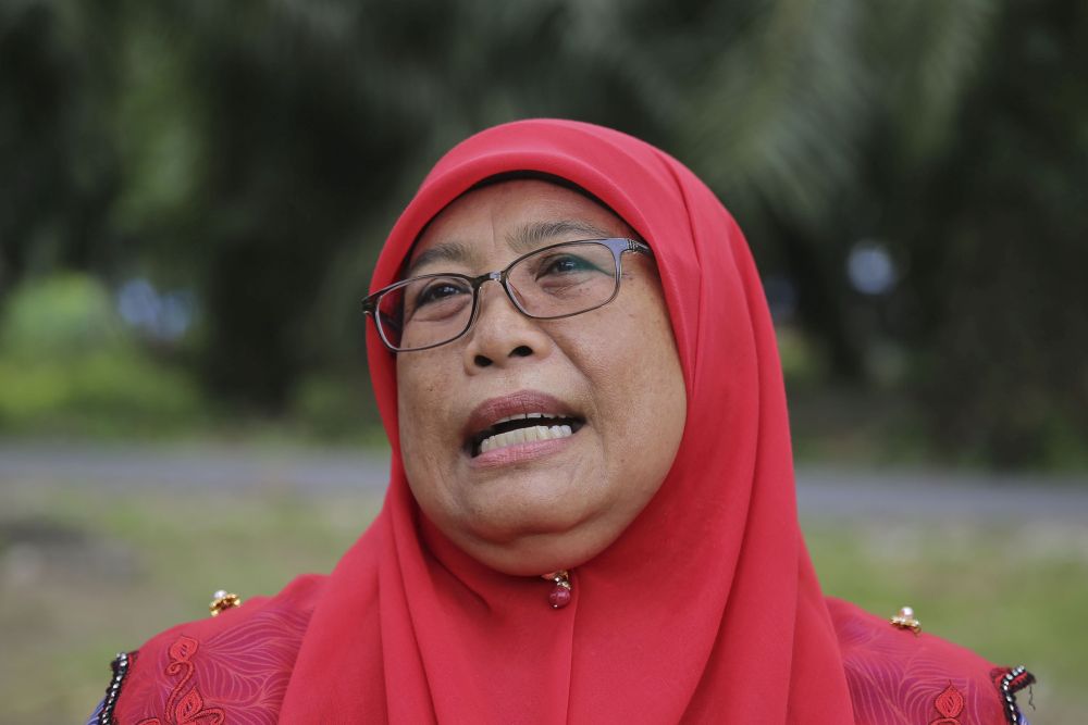 Manisah Sariddin says flooding has been an issue for villagers. — Picture by Yusof Mat Isa