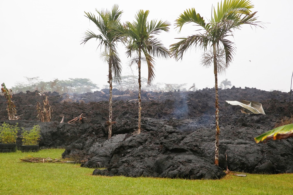 Lava cools in a resident's yard in the Leilani Estates subdivision during ongoing eruptions of the Kilauea Volcano, Hawaii, May 8, 2018. u00e2u20acu201d Reuters pic