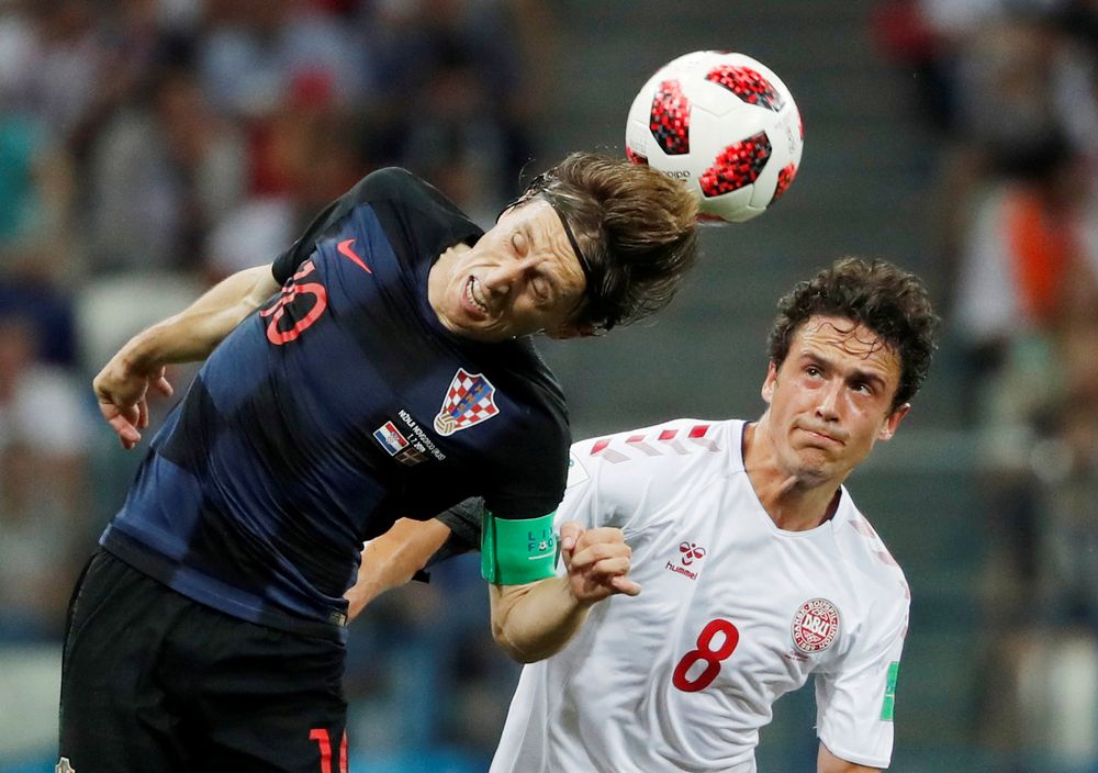 Croatiau00e2u20acu2122s Luka Modric in action with Denmarku00e2u20acu2122s Thomas Delaney during their World Cup Round of 16 match at Nizhny Novgorod Stadium, Nizhny Novgorod, Russia, July 1, 2018. u00e2u20acu201d Reuters pic