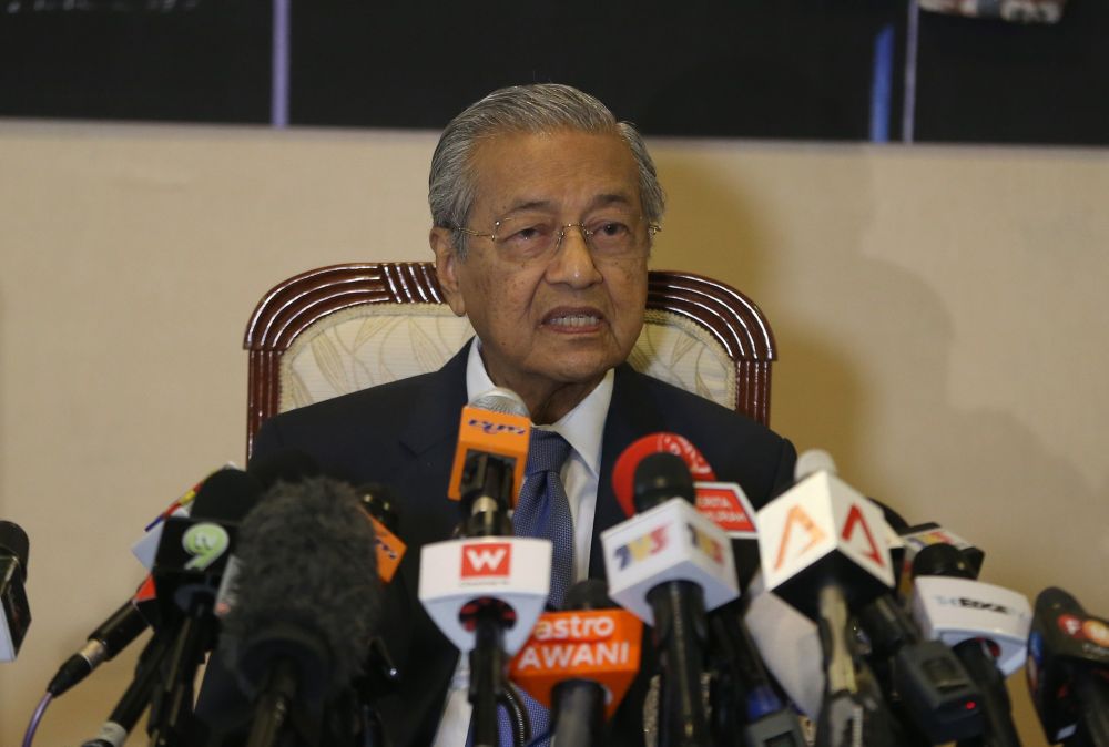 Tun Dr Mahathir Mohamad speaks during a press conference in Putrajaya May 16, 2018. u00e2u20acu2022 Picture by Razak Ghazali