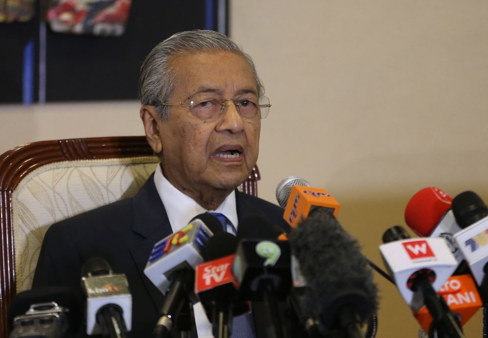 Tun Dr Mahathir Mohamad speaks during a press conference in Putrajaya May 16, 2018. u00e2u20acu2022 Picture by Razak Ghazali
