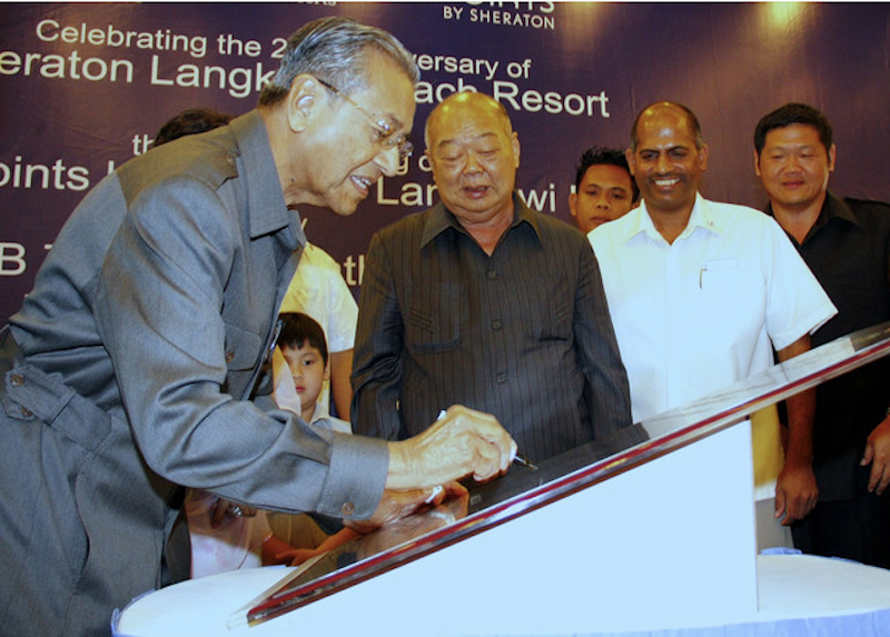 In this file photo, Tun Dr Mahathir Mohamad signs a plaque, as Tan Sri Ting Pek Khiing looks on, at the opening of Four Points Hotel in Kuala Muda, Padang Matsirat, Langkawi November 4, 2011. u00e2u20acu201d Bernama pic