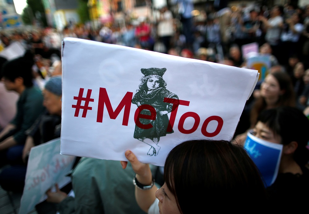 A protester raises a placard reading '#MeToo' during a rally against harassment at Shinjuku shopping and amusement district in Tokyo, Japan, April 28, 2018. u00e2u20acu201d Reuters pic