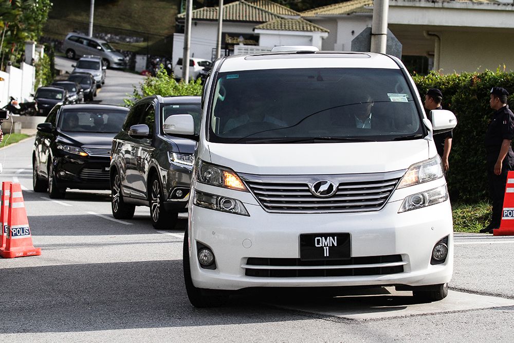 A white Toyota Vellfire believed to be ferrying Datuk Seri Najib Razak is seen leaving his residence in Kuala Lumpur May 24, 2018. u00e2u20acu201d Picture by Miera Zulyana