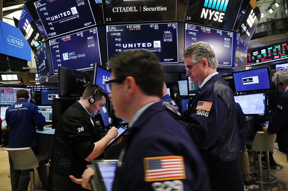 Traders work on the floor of the New York stock Exchange (NYSE) on May 2, 2018 in New York City. u00e2u20acu201d AFP pic