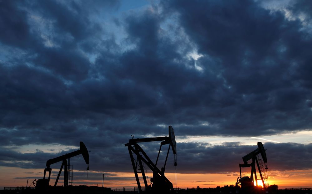Oil pumps are seen at sunset outside Vaudoy-en-Brie, near Paris, France April 23, 2018. REUTERS/Christian H