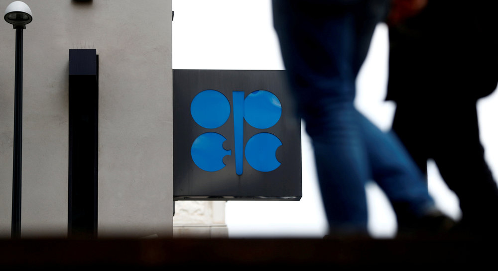 People walk past the logo of the Organisation of the Petroleum Exporting Countries (Opec) in front of its headquarters in Vienna September 21, 2017. u00e2u20acu201d Reuters picn