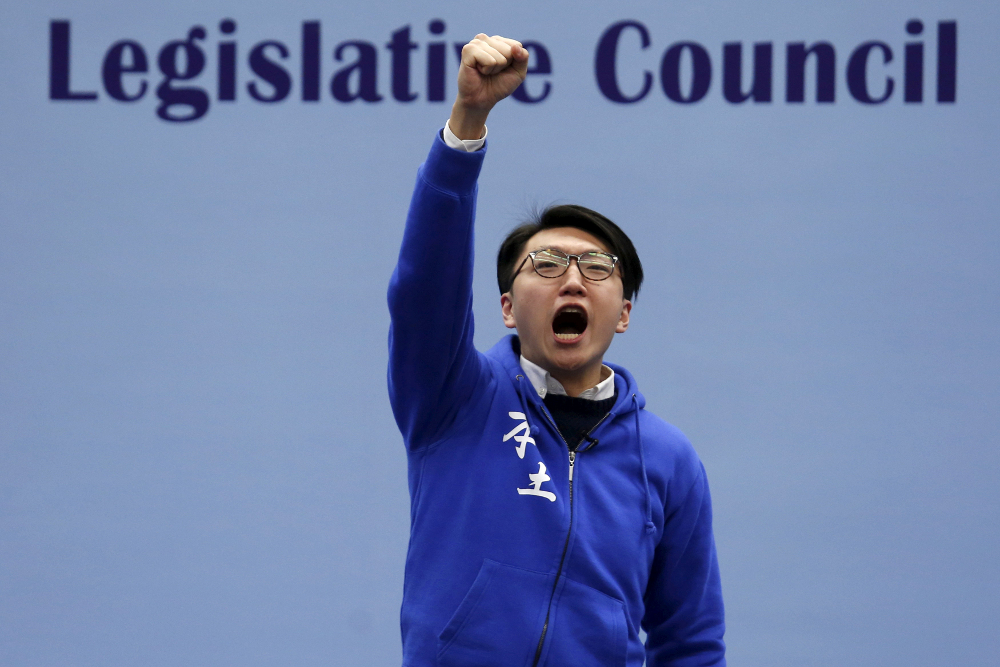 Edward Leung, a candidate from the Hong Kong Indigenous, chants slogans on the podium before the final poll result is announced in Hong Kong February 29, 2016. u00e2u20acu201d Reuters pic