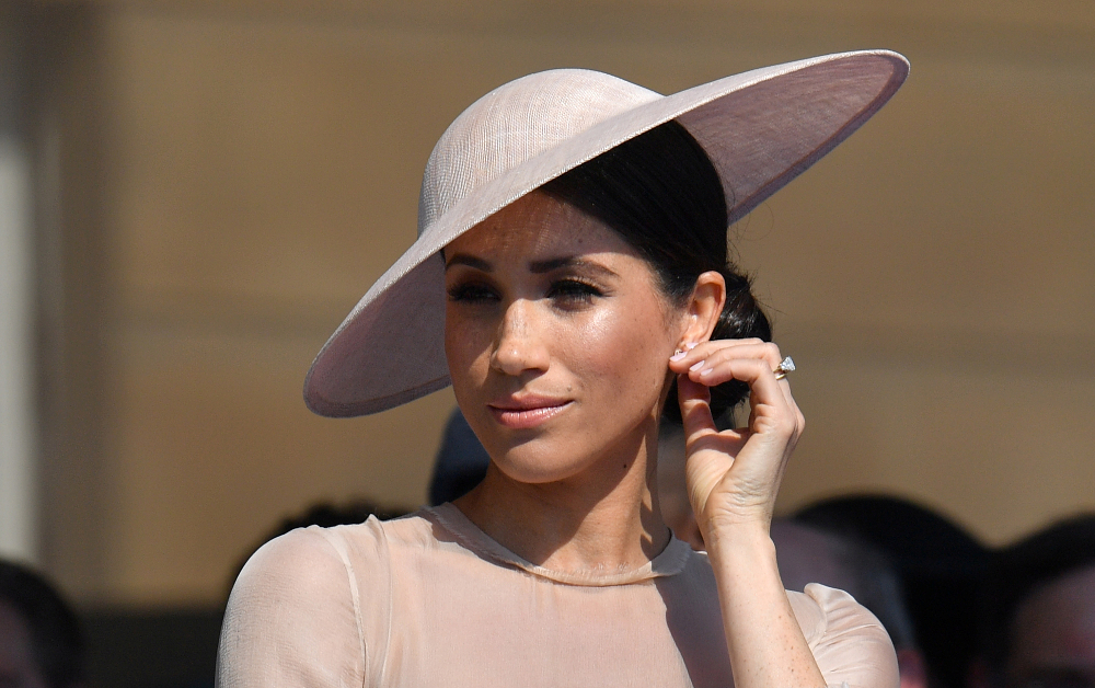 Meghan, Duchess of Sussex attends a garden party at Buckingham Palace, in London May 22, 2018. u00e2u20acu201d Picture by Dominic Lipinski/Pool via Reuters