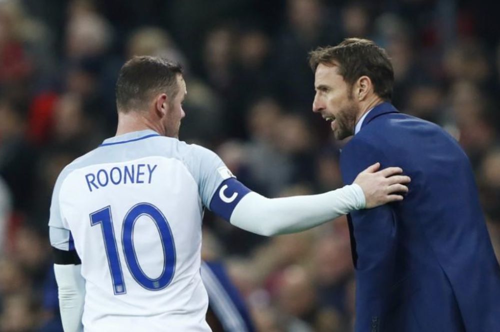 File picture shows England interim manager Gareth Southgate speaking with Wayne Rooney during their World Cup Qualifying European Zone u00e2u20acu201c Group F match against Scotland in Wembley Stadium, London, November 11, 2016. u00e2u20acu201d Reuters pic