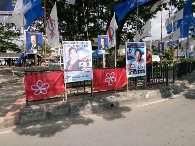 Flags from deregistered Parti Pribumi Bersatu Malaysia (PPBM) were found among other campaign paraphernalia in Donggongon that were allegedly not placed there by Pakatan Harapan. u00e2u20acu201d Picture courtesy of DAP