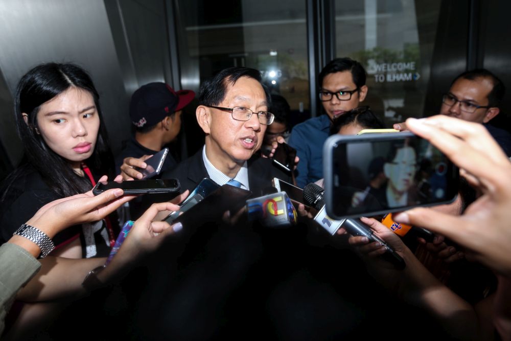 Malaysia China Chamber Commerce president Tan Yew Sing speaks to reporters at the entrance of the Ilham Tower on May 24, 2018. u00e2u20acu201d Picture by Ahmad Zamzahuri