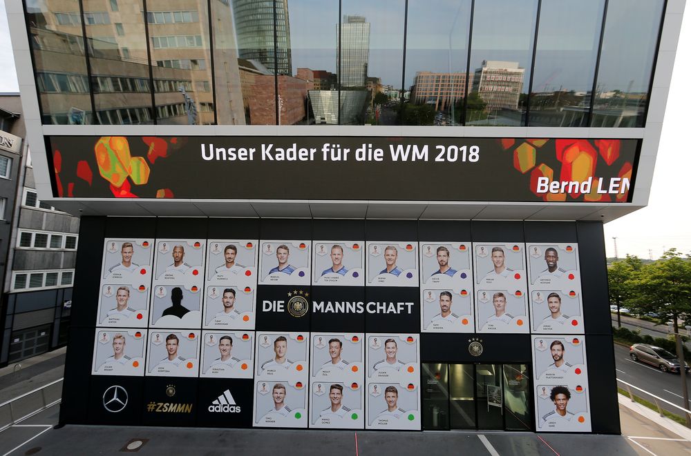 Portraits of selected players for Germanyu00e2u20acu2122s preliminary 27-man squad for the 2018 Fifa World Cup are seen on the facade of the German Football Museum in Dortmund, Germany, May 15, 2018. u00e2u20acu201d Reuters pic