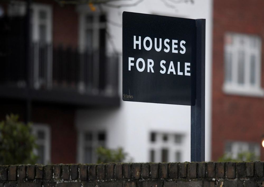 Property sale signs are seen outside of a group of newly built houses in west London, Britain, November 23, 2017. u00e2u20acu201d Reuters pic