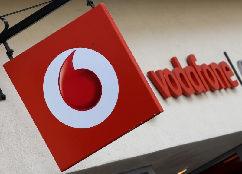 Branding hangs outside a Vodafone shop in Oxford, Britain, May 16, 2017. u00e2u20acu201d Reuters pic