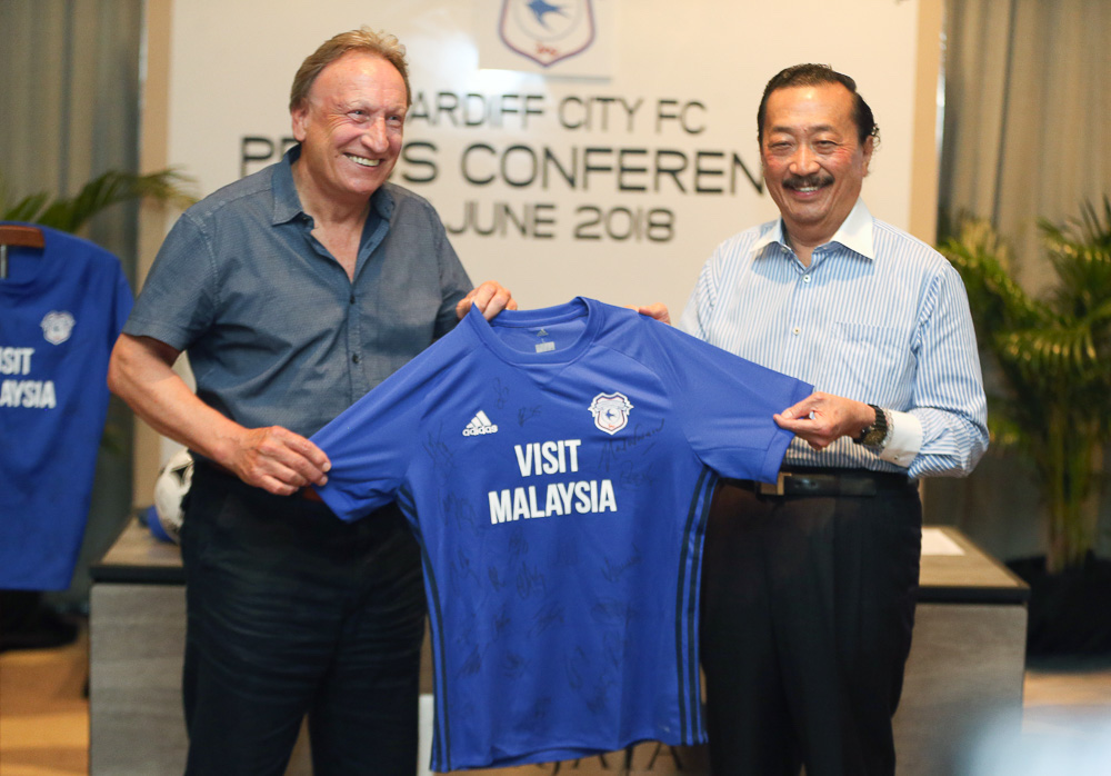 Tan Sri Vincent Tan, owner of Cardiff City FC, seen here with manager of the club Neil Warnock, Kuala Lumpur June 7, 2018. u00e2u20acu201d Picture by Razak Ghazali