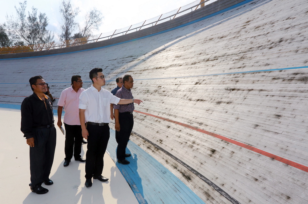 Perak youth and sports exco Howard Lee Chuan How making a site visit to the velodrome in Ipoh June 13, 2018. u00e2u20acu201d Picture by Marcus Pheong 
