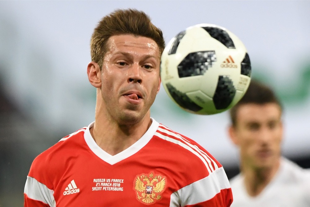 Russia's forward Fyodor Smolov eyes the ball during an international friendly football match between Russia and France at the Saint Petersburg Stadium in Saint Petersburg March 27, 2018. u00e2u20acu201d AFP pic
