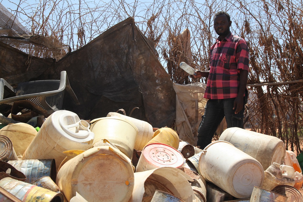 Somali refugee, Adow Sheikh Aden, 32, shows the different types of plastic collected for recycling in Dabaab refugee camp in Garissa County, Kenya on May 30, 2018. u00e2u20acu201d Picture by Thomson Reuters Foundation