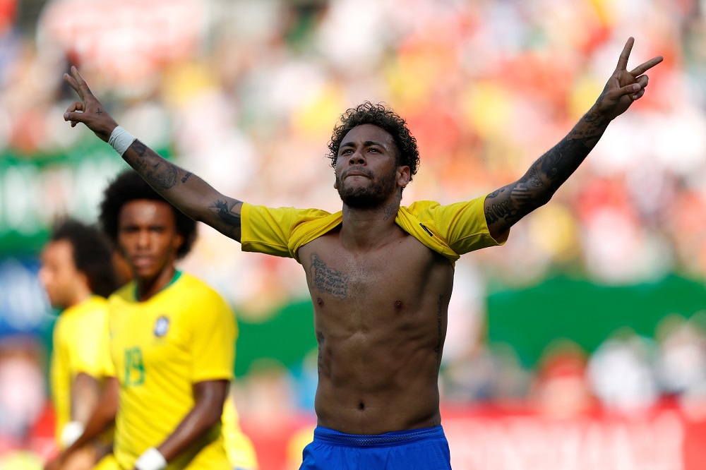 Brazil's Neymar celebrates scoring their second goal against Austria in Vienna June 10, 2018. u00e2u20acu201d Reuters pic