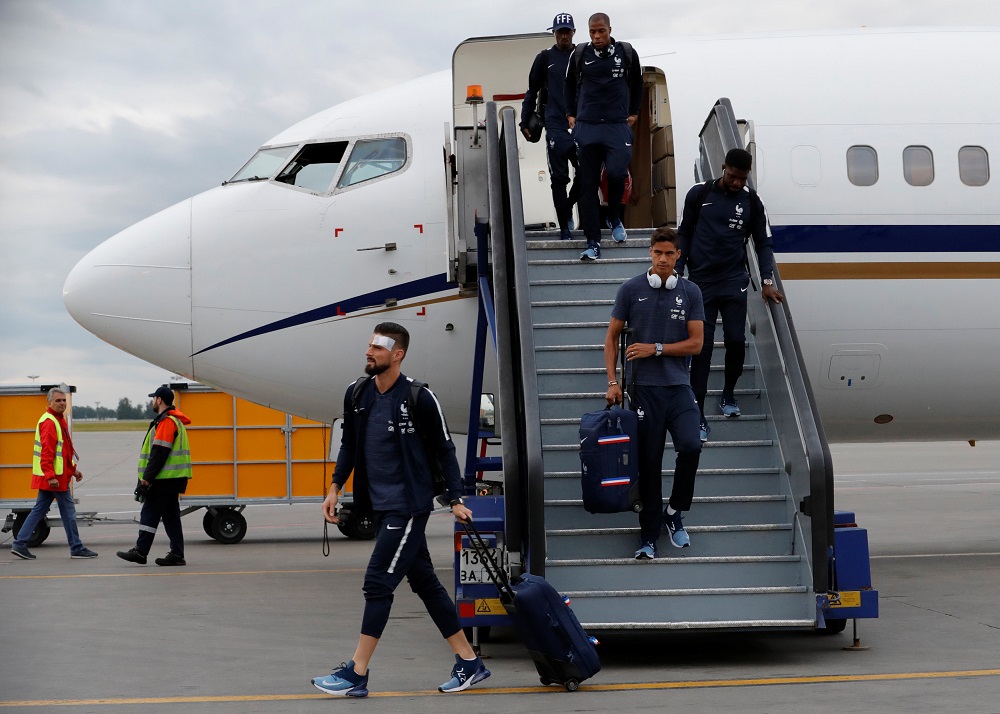 Olivier Giroud and his team mates disembark from a plane in Moscow June 10, 2018. u00e2u20acu201d Reuters pic