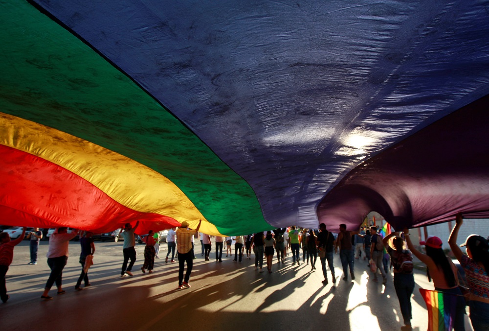 Members of the LGBT community carry a rainbow flag during a march in support of gay marriage, sexual and gender diversity in Ciudad Juarez, Mexico June 10, 2018. u00e2u20acu201d Reuters pic