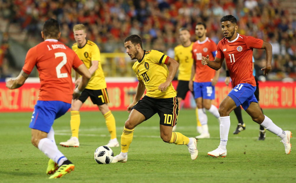 Belgiumu00e2u20acu2122s Eden Hazard in action with Costa Ricau00e2u20acu2122s Johan Venegas and Johnny Acosta during the international friendly at King Baudouin Stadium in Brussels June 11, 2018. u00e2u20acu201d Reuters pic